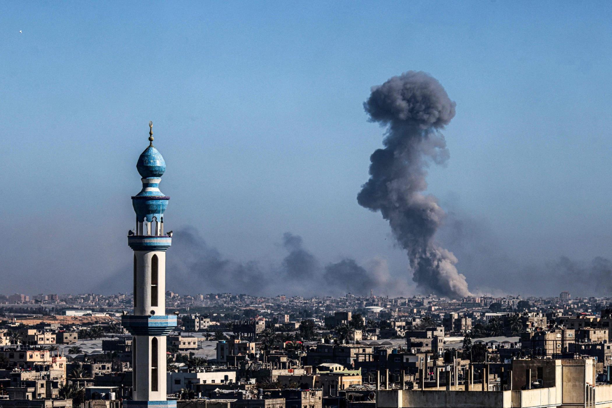 A picture taken from Rafah shows smoke billowing during Israeli bombardment over Khan Younis, southern Gaza Strip, Palestine, Feb. 11, 2024. (AFP Photo)