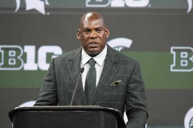 FILE - Michigan State head coach Mel Tucker speaks during an NCAA college football news co<em></em>nference at the Big Ten Co<em></em>nference media days at Lucas Oil Stadium, Wednesday, July 26, 2023, in Indianapolis. ichigan State athletic director Alan Haller has informed suspended football coach Mel Tucker he is being fired for cause without compensation for his co<em></em>nduct with activist and rape survivor Brenda Tracy. “The notice provides Tucker with seven calendar days to respond and present reasons to me and the interim president as to why he should not be terminated for cause,” Haller said in a statement sent by the school on Monday, Sept. 18.(AP Photo/Darron Cummings, File)