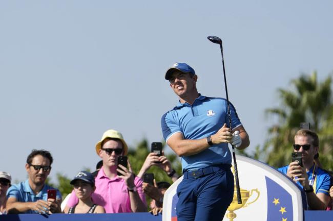 Europe’s Rory McIlroy reacts to his tee shot on the 10th hole during Wednesday’s practice round ahead of this weekend’s Ryder Cup in Guido<em></em>nia Montecelio, Italy. (Alessandra Tarantino / ASSOCIATED PRESS)