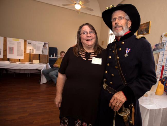 Church members Mace Gjerman (dressed in a Civil War uniform) and wife Tanya Gjerman, both of Windsor, have their photo taken during a free benefit breakfast at Windsor Presbyterian Church in Windsor, Sunday, Sept. 24, 2023. (Darryl Bush / For The Press Democrat)