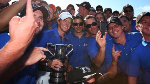 Rory McIlroy of Ireland with the Sto<em></em>nehaven Cup and ground staff winner of the 2013 Emirates Australian Open Golf Champio<em></em>nship at Royal Sydney Golf Course. pic. Phil Hillyard