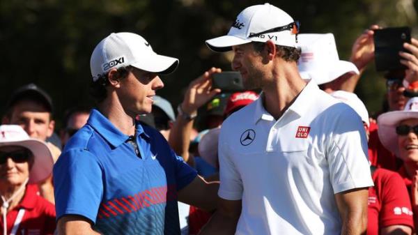 Rory McIlroy winner co<em></em>ngratulates runner up Adam Scott at the 2013 Emirates Australian Open Golf Champio<em></em>nship at Royal Sydney Golf Course. pic. Phil Hillyard